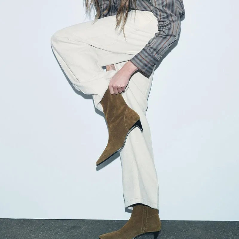 Brown square toe women's ankle boots with a side zipper, kitten heel, and a waterproof platform sole.