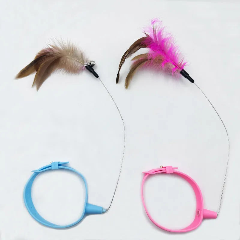 Pink cat collar toy with feather and bell made from steel wire and plastic for neck circumference 17-27cm