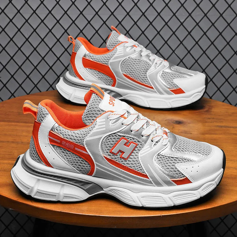 Men's black and white mesh casual running shoes with a round toe and plastic sole.