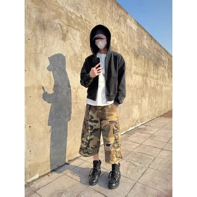 Men's cropped camouflage jeans with retro patch and ripped detailing in straight leg cut
