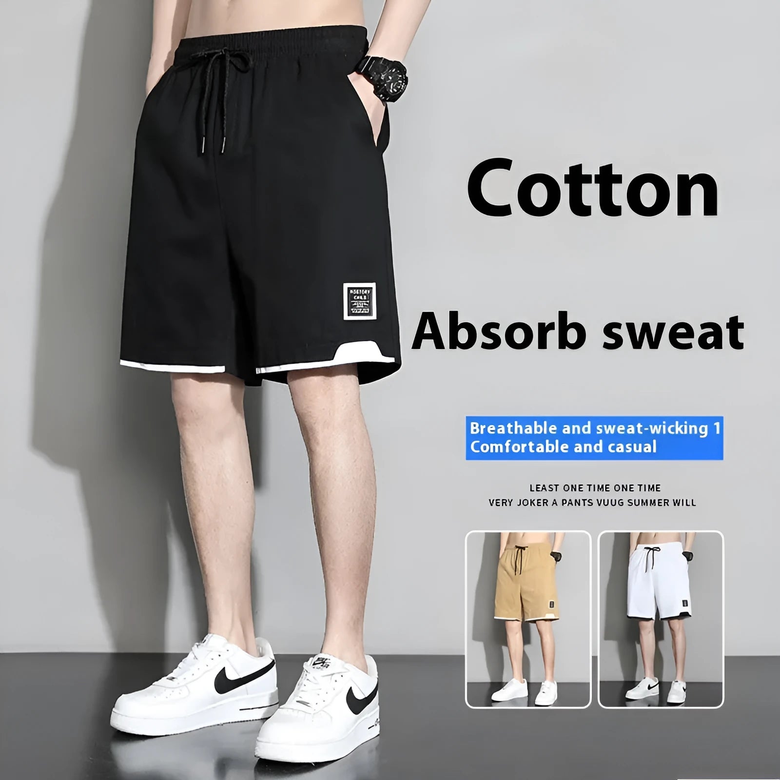 Boys' black cotton shorts in a plus size on a hanger