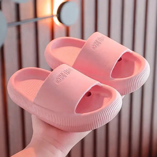 Children's EVA slippers in bright colours with non-slip soles, showing size options from 15.5cm to 21.5cm