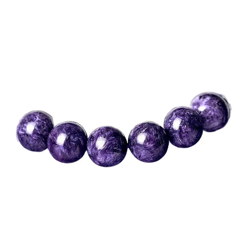 Natural transparent charoite crystal bracelet with platinum settings showing different bead size options