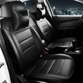 Genuine cow leather car seat cover in a black with red line colour option, showing binding style edge.