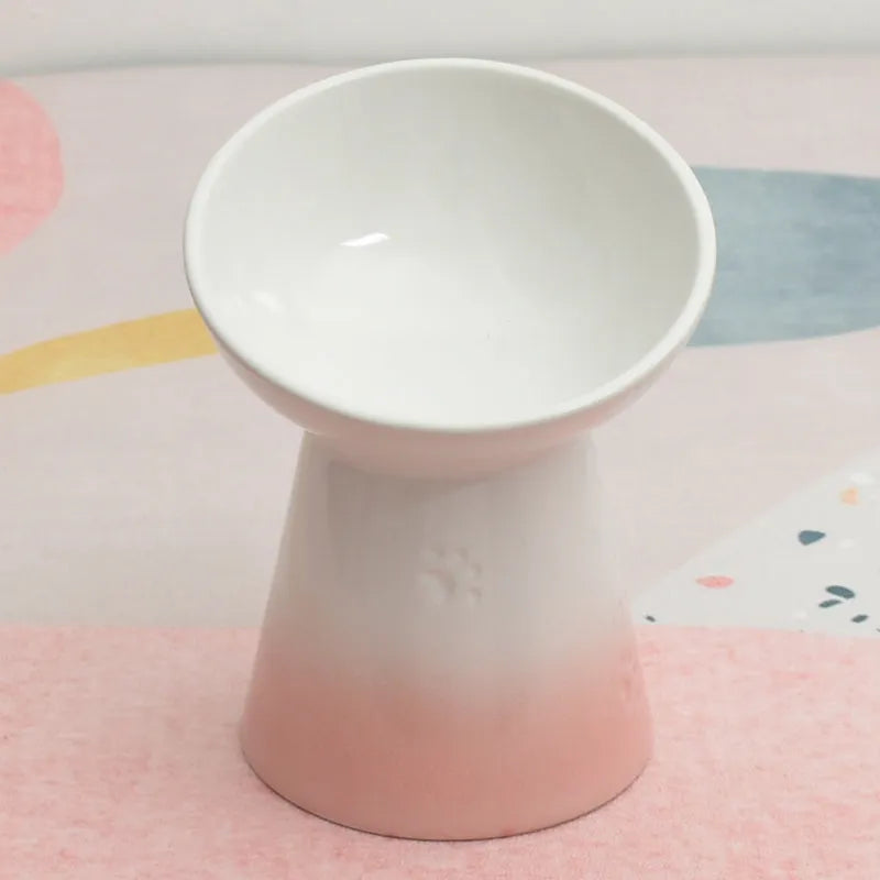 Ceramic pet bowl with high foot design showing anti-tumble stability feature