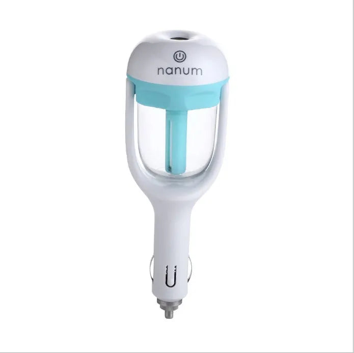 Compact blue car humidifier with rotating nozzle on a car dashboard