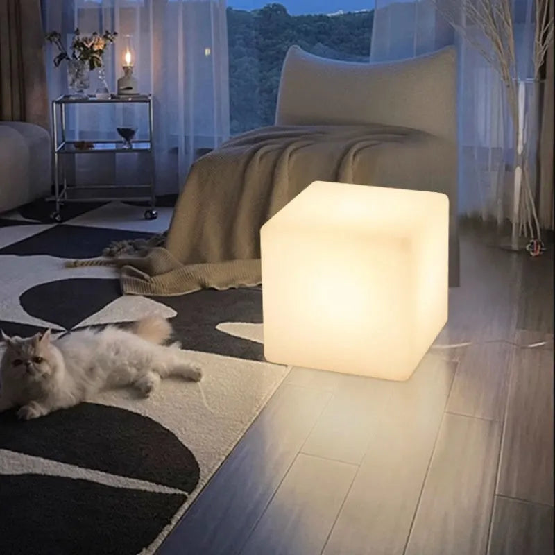 Modern square LED cube light stool in outdoor setting showing waterproof IP65 design
