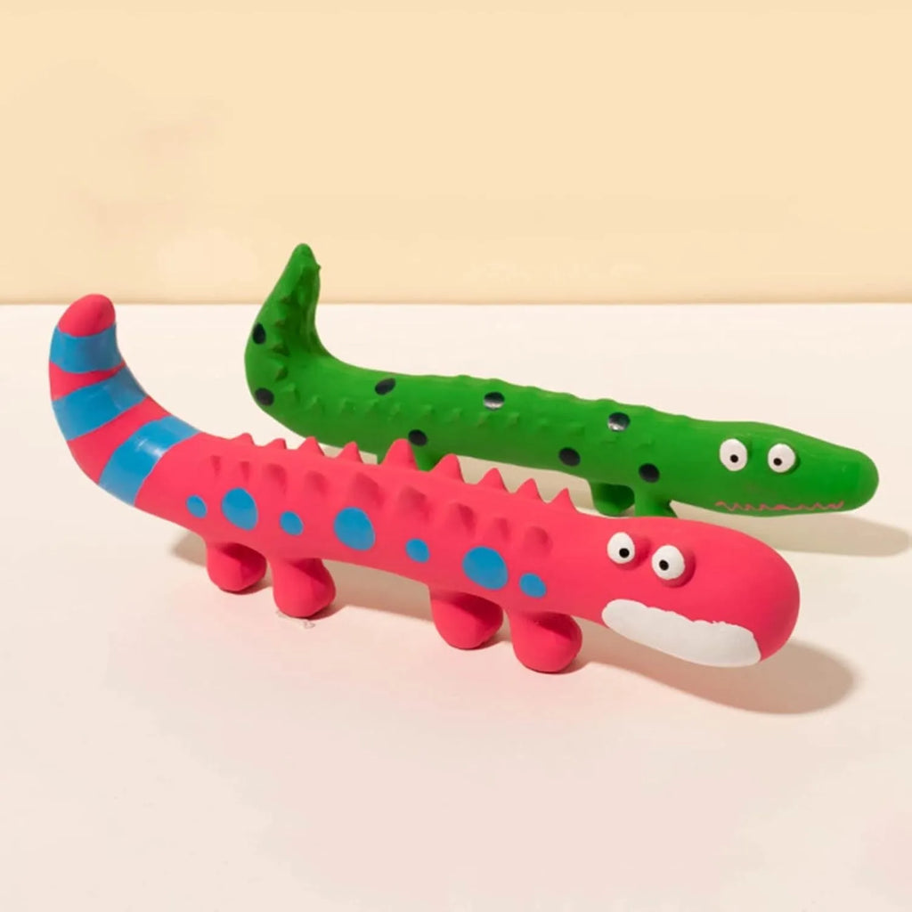 Green lizard-shaped dog chew toy with textured surface and squeaker for aggressive chewing dogs