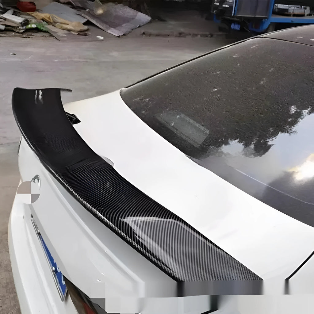 Universal punch-free car spoiler made from ABS plastic, shown in bright black finish.