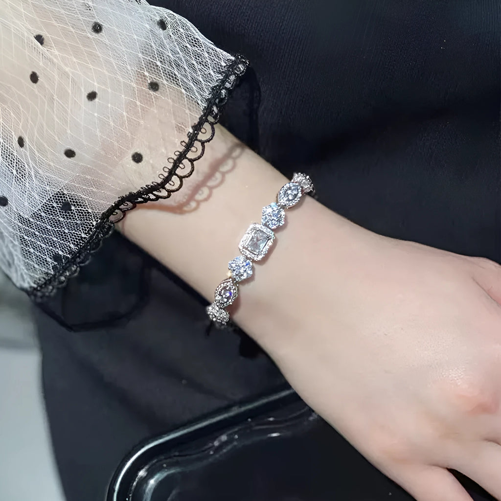 Women's geometric bracelet with S925 sterling silver plating and inlaid zircon stones showing adjustable chain