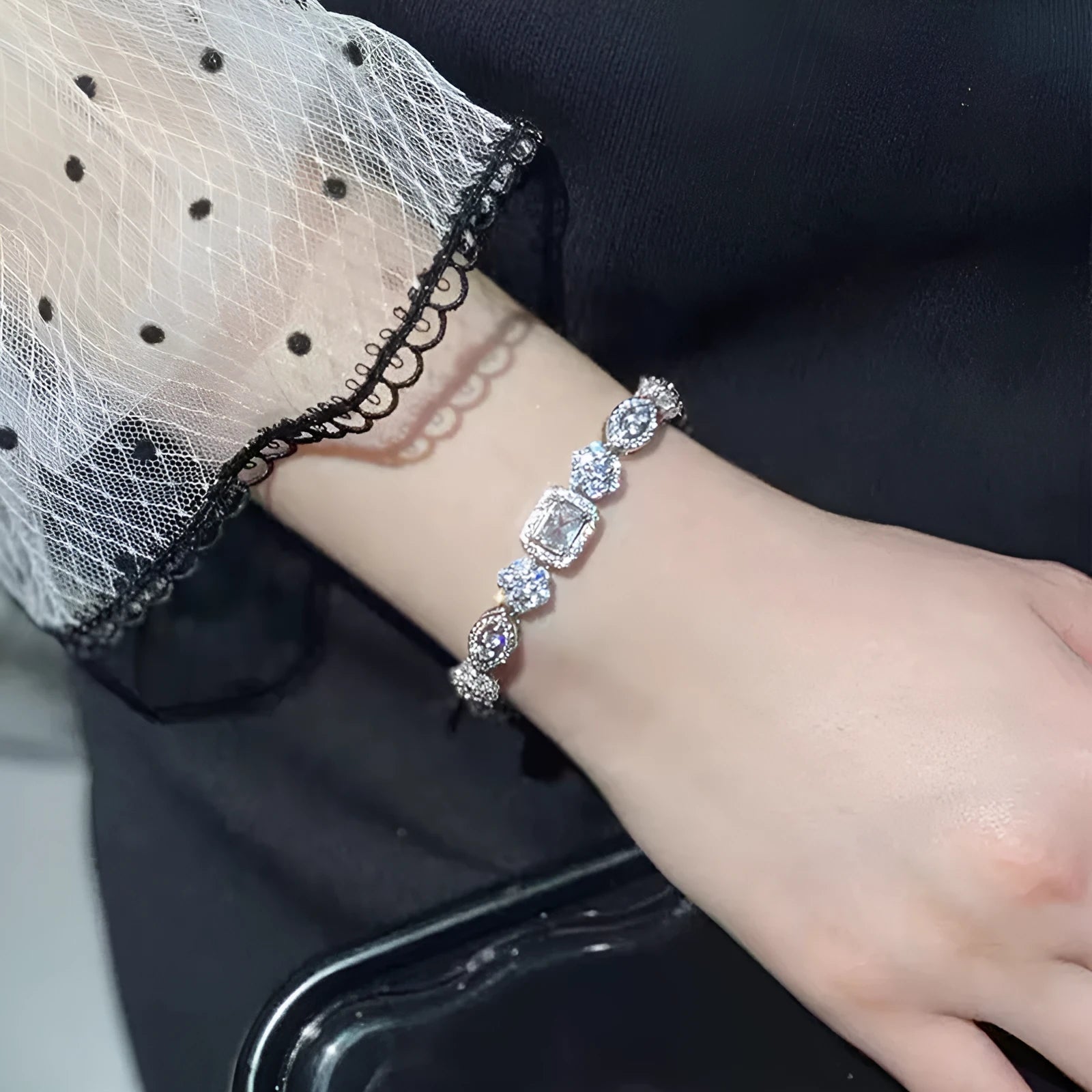 Women's geometric bracelet with S925 sterling silver plating and inlaid zircon stones showing adjustable chain