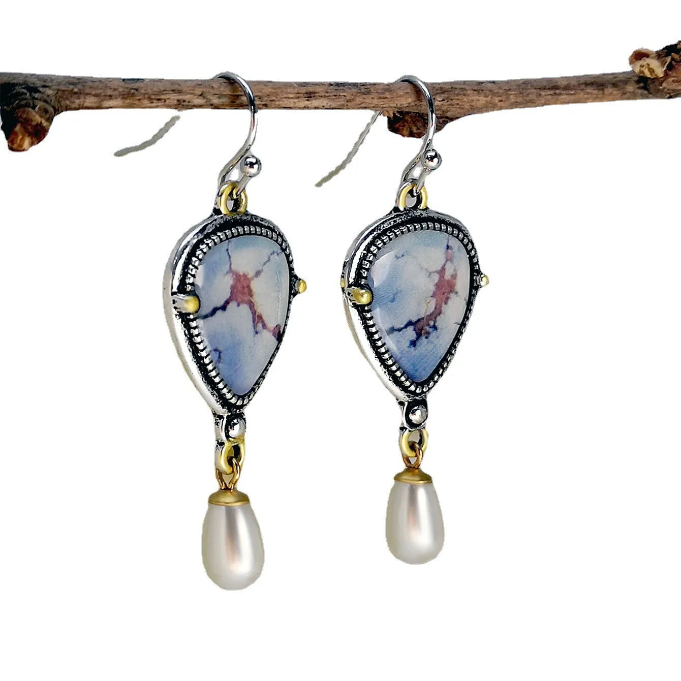 Bohemian geometric drop earrings with synthetic blue opal and white pearls on retro blue electroplated metal