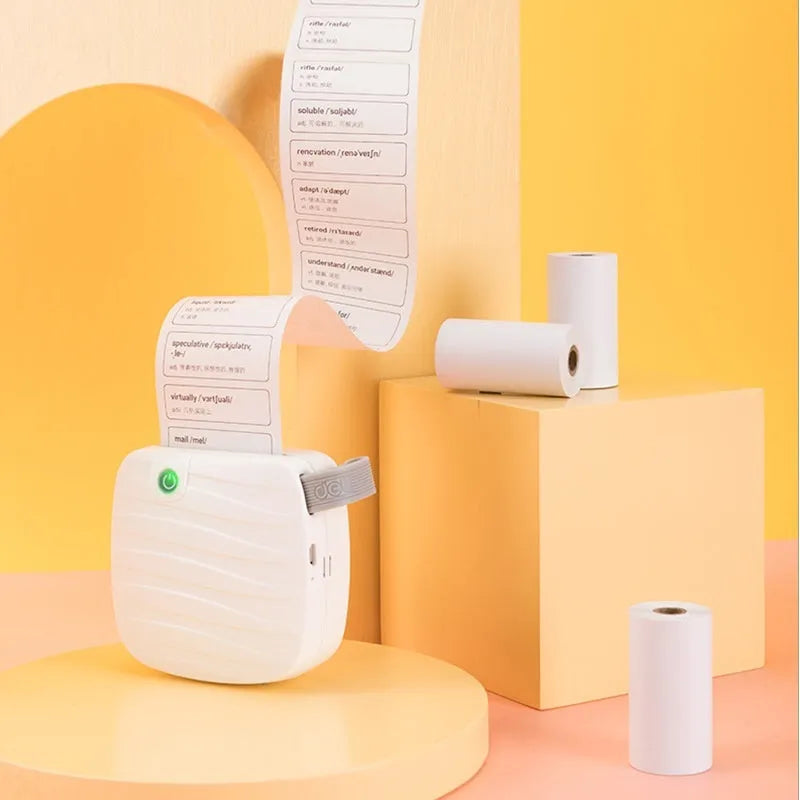 Three rolls of 57x30mm thermal paper in packaging for small printers