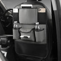 Leather car seat back storage bag in suspended mounting position