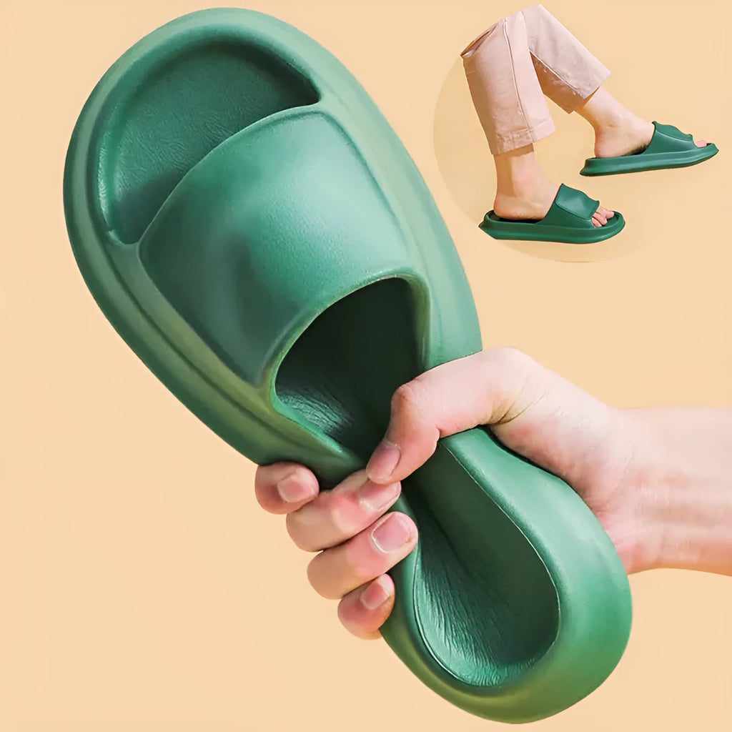 A pair of thick-soled, soft EVA flip-flop slippers with a non-slip tread pattern.