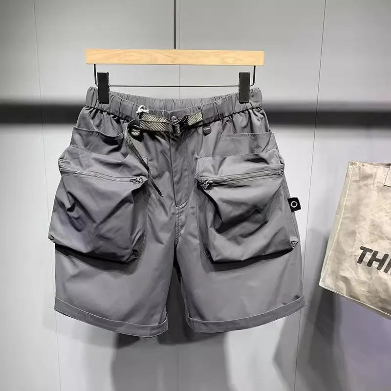 Men's black work shorts with multiple pockets and above-knee length