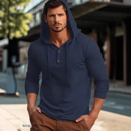 Men's dark blue cotton pullover hoodie with long sleeves on a hanger