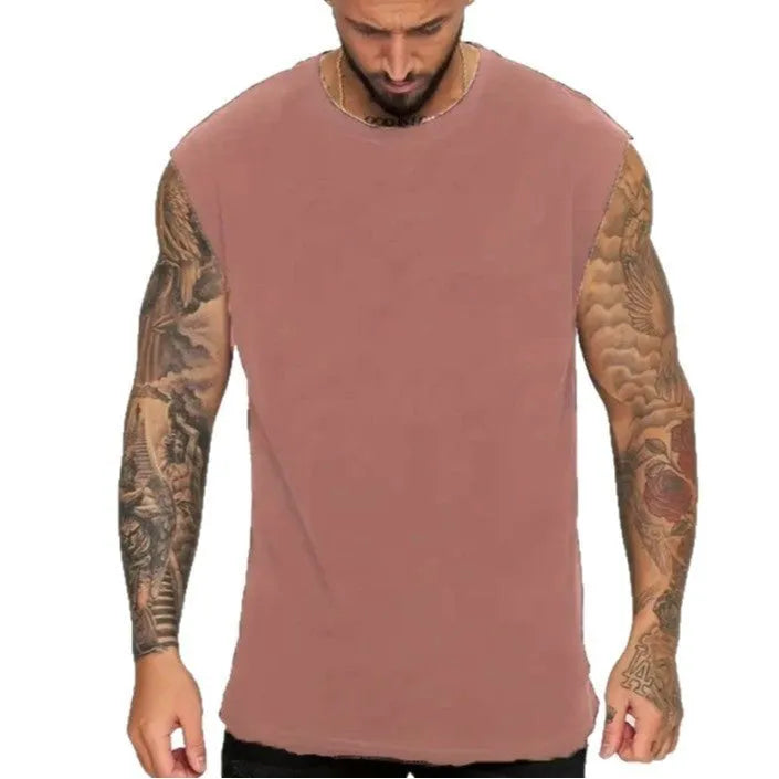 Men's loose fit solid colour cotton tank top shown in apricot, available in sizes up to 5XL.