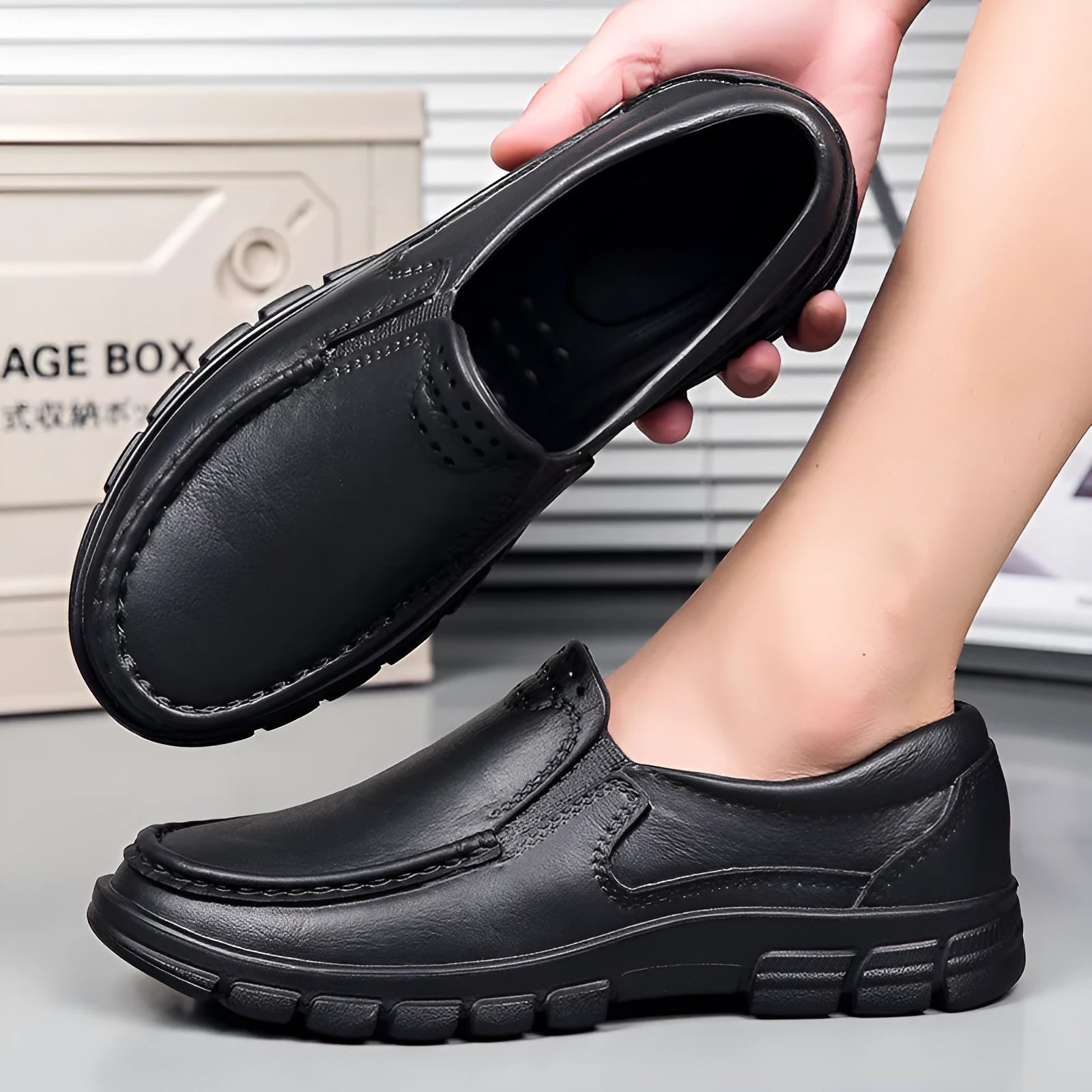 Men's black slip-on work shoes with waterproof platform heel and artificial leather upper