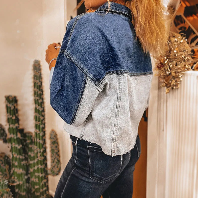 Women's loose-fitting denim coat with multiple buckle fastenings in a single row