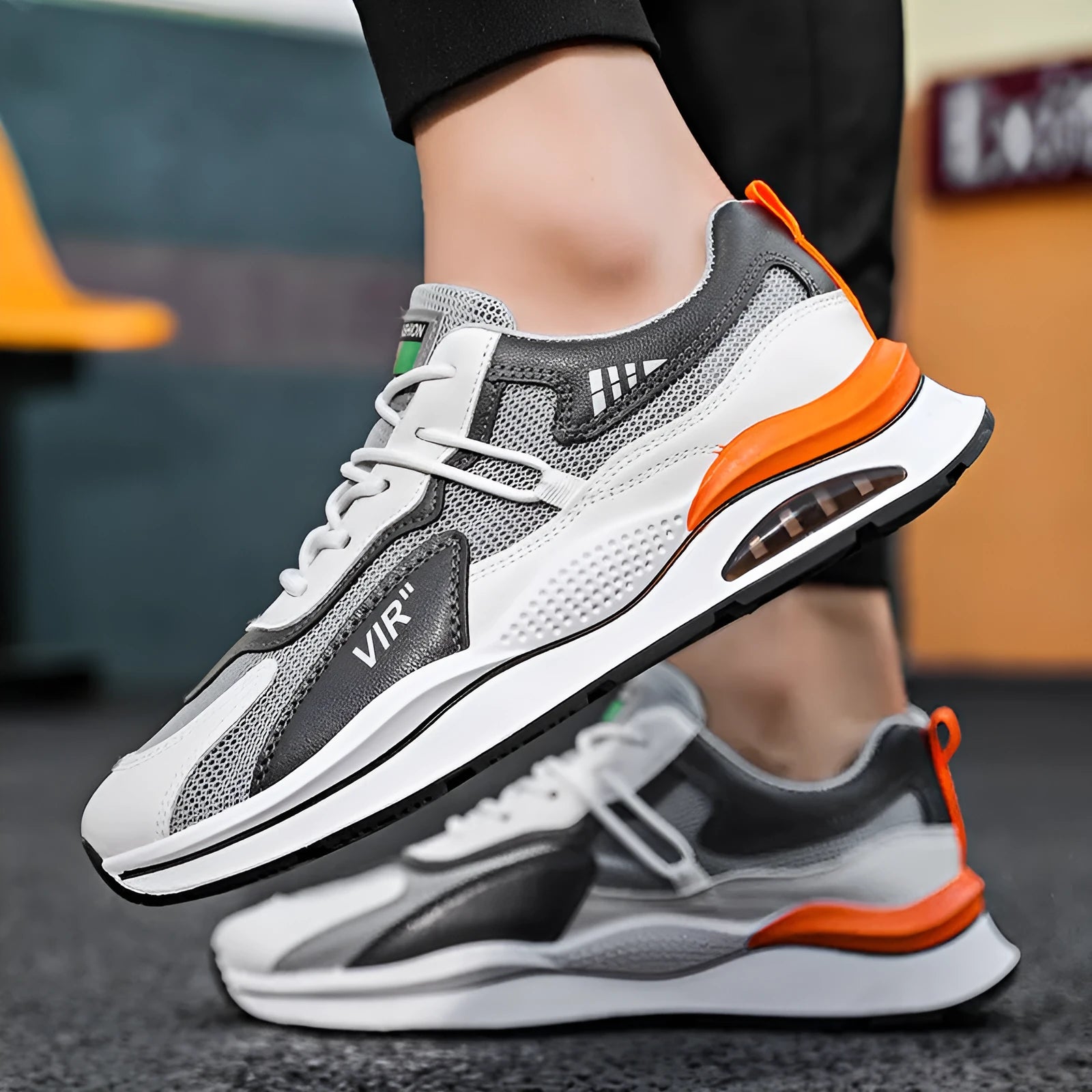Men's grey breathable mesh casual trainers with a round toe and lightweight EVA sole.