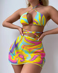 Yellow striped women's halter lace-up swimsuit set with matching skirt and shorts