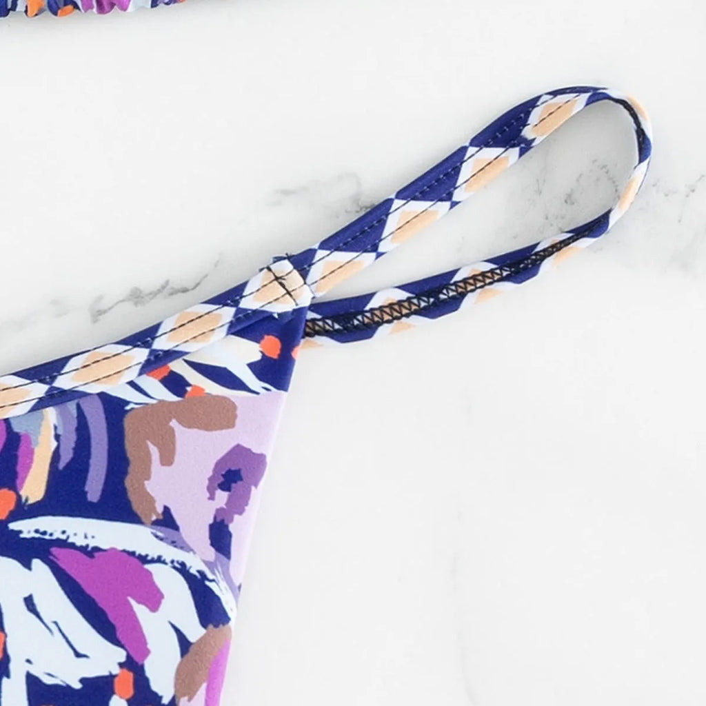 Women's floral print triangle swimsuit in polyester fabric with briefs style cut
