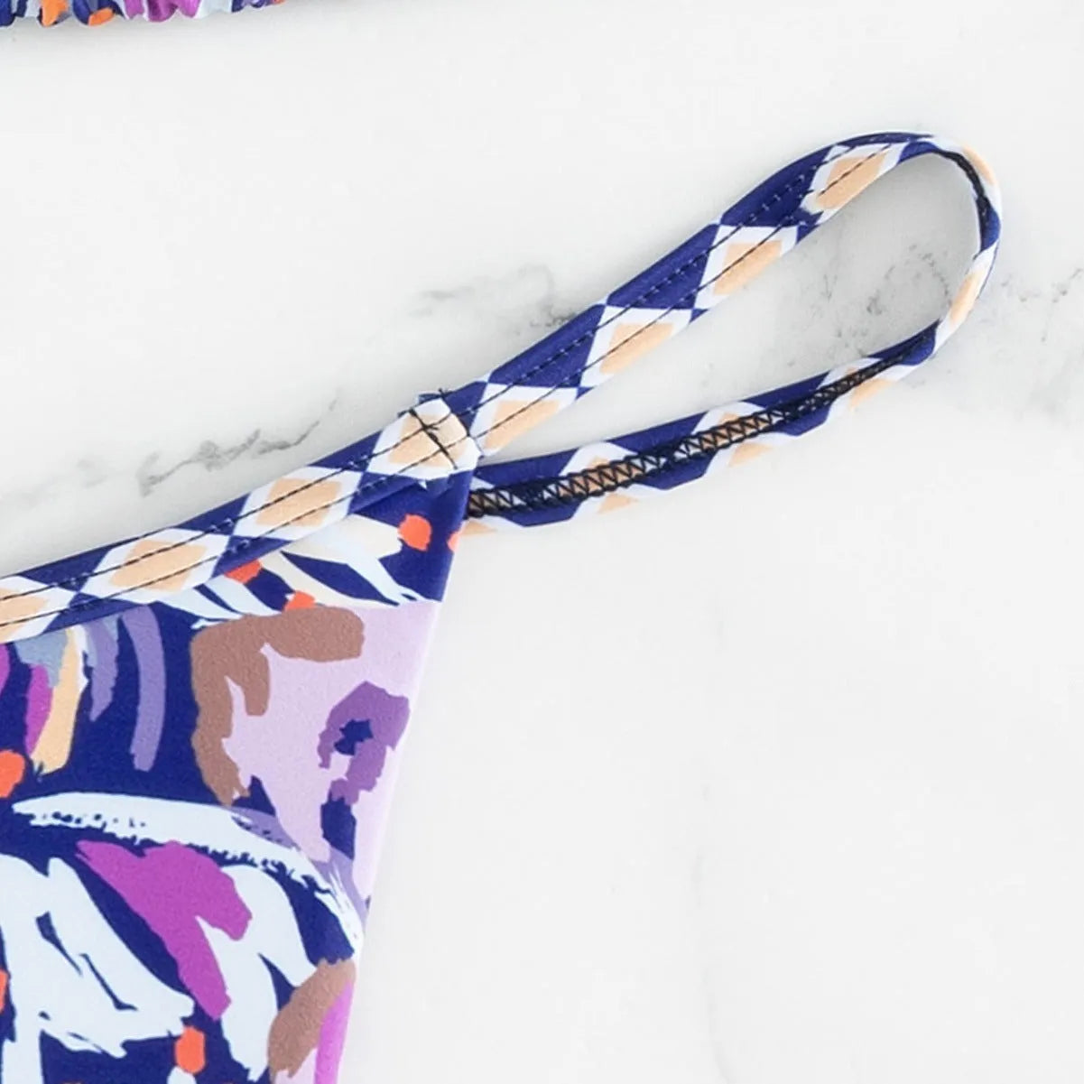 Women's floral print triangle swimsuit in polyester fabric with briefs style cut