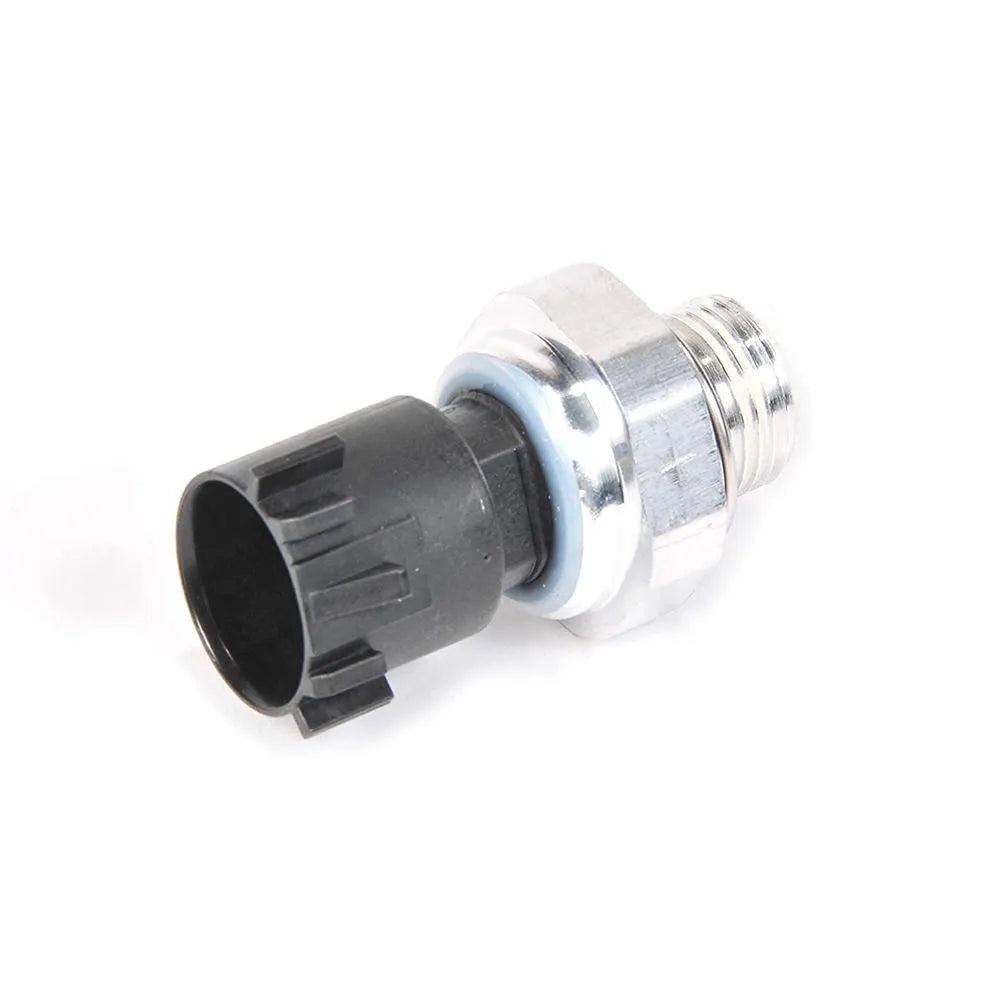Silver automobile fuel pressure sensor with electrical connector.