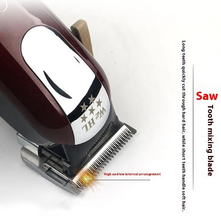 Charging hair clipper with stainless steel cutter head on a white background