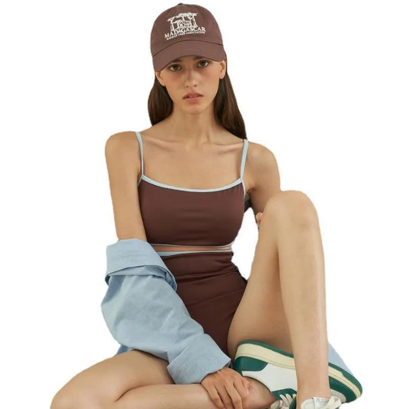 Brown women's triangle one-piece swimsuit made from nylon fabric.