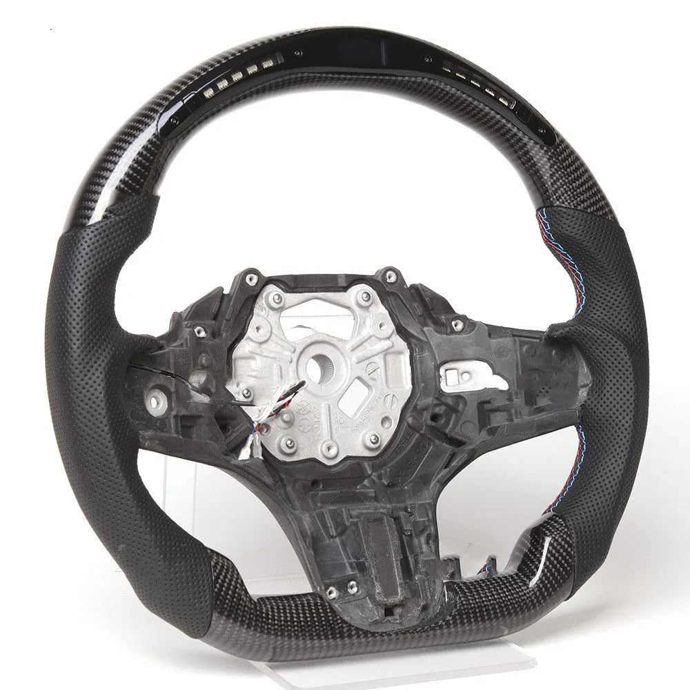 Black carbon fibre BMW steering wheel with LED elements and paddle shifters