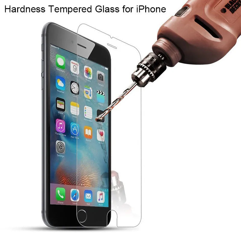 Tempered glass screen protector for iPhone models on a clean surface.
