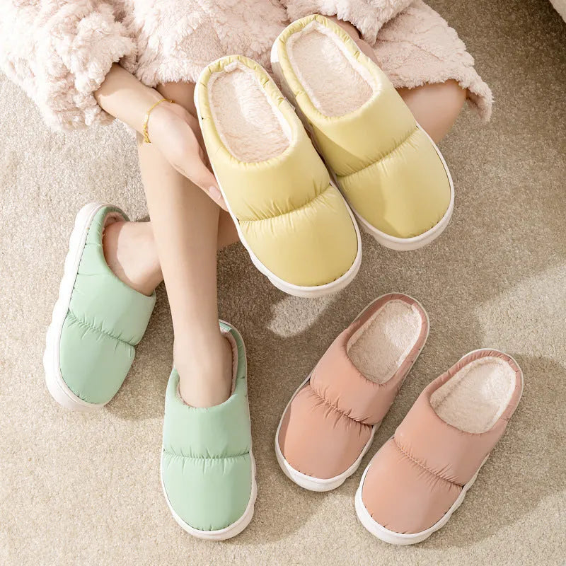 Down cotton slippers with artificial leather upper and thick rubber soles in multiple colour options