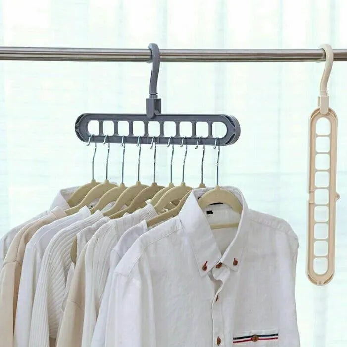 Plastic clothes hanger with rotating hook showing pink and green colour options