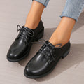 Black women's work shoes with chunky 3-5cm heel and rubber sole