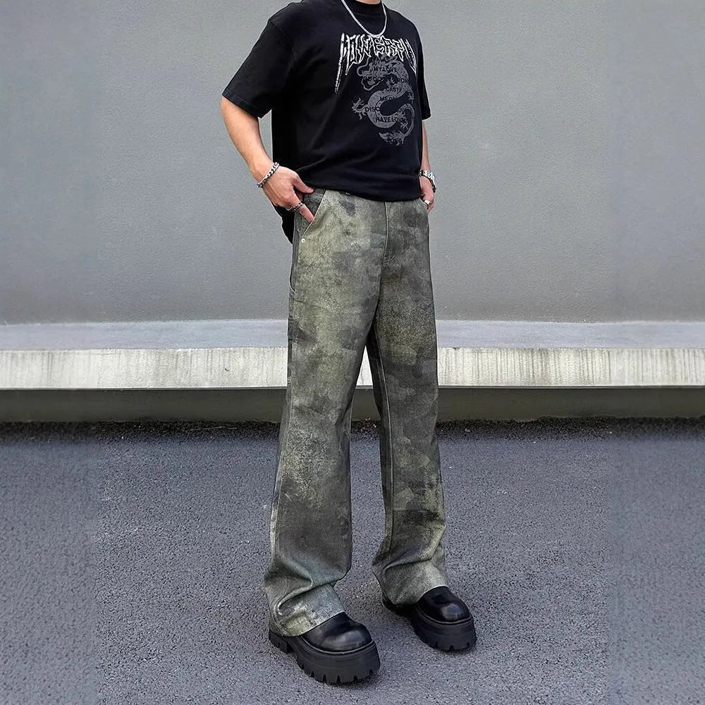 Men's straight leg jeans in a retro digital camouflage pattern on blue denim