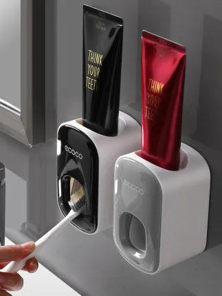 Wall mounted automatic toothpaste holder dispenser set with toothbrush slots and upside-down mouthwash cup in black plastic