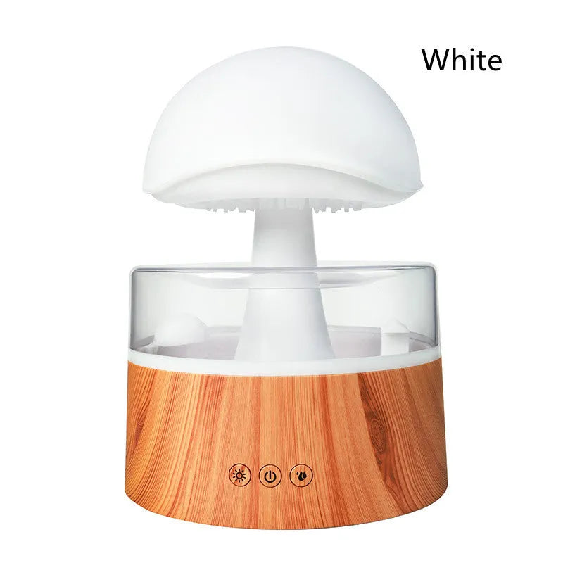 White cloud-shaped ultrasonic humidifier and aroma diffuser with simulated rain drops and coloured light.