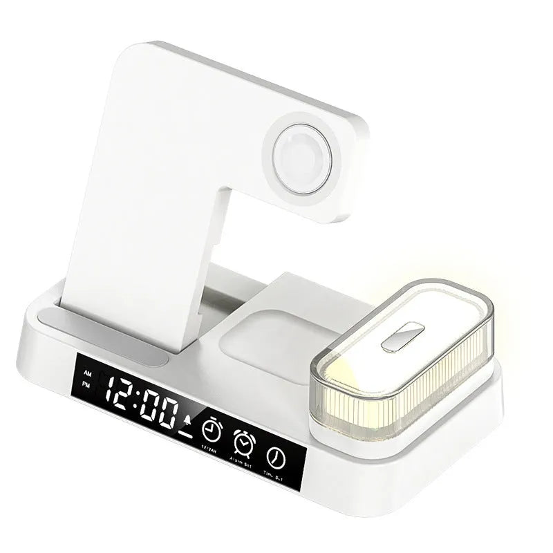 White 4-in-1 multifunction wireless charger station with foldable stand, alarm clock display, and RGB night light.