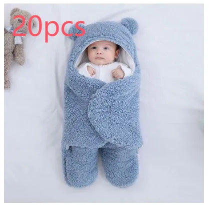 Cotton blend baby quilted sleeping bag wrapper shown in light blue colour