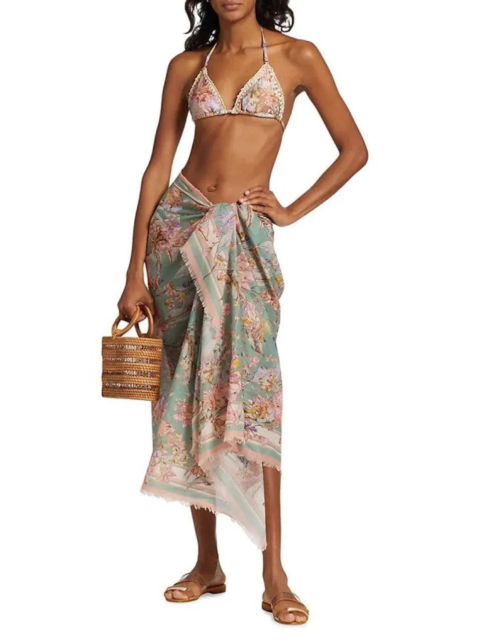 Women's creamy white floral print bikini set with top, briefs, and detachable skirt