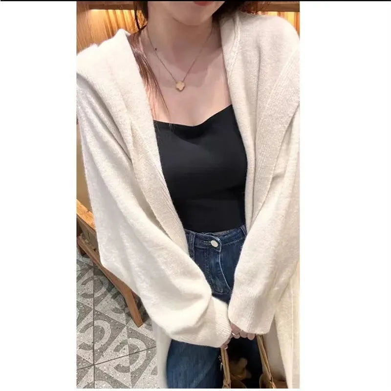 Women's long knitted cardigan with hood in oatmeal colour, below knee length, loose fit