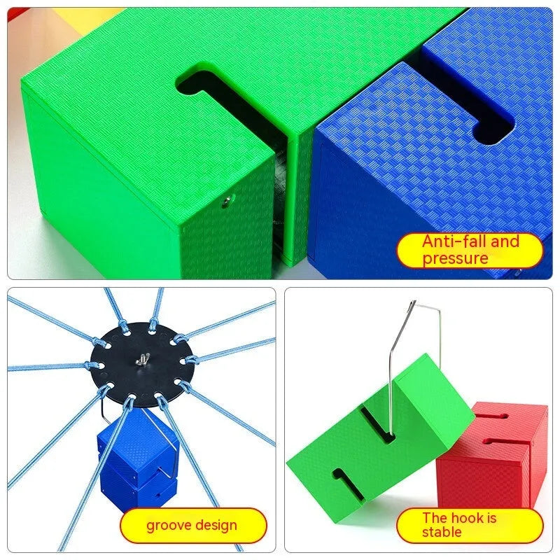 Outdoor team building game equipment set with coloured ABS plastic blocks, ropes, and a hook frame.