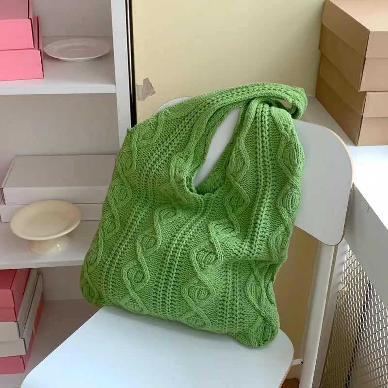 Women's retro style hollow knitted polyester tote bag in a solid colour, showing large open top and textured yarn material.