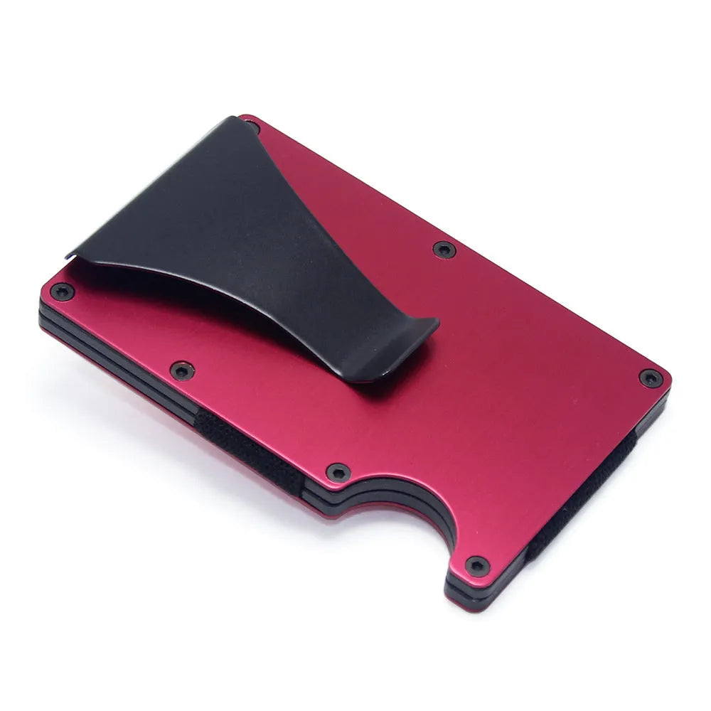 Black geometry-style slim card holder for bank cards and notes on a table