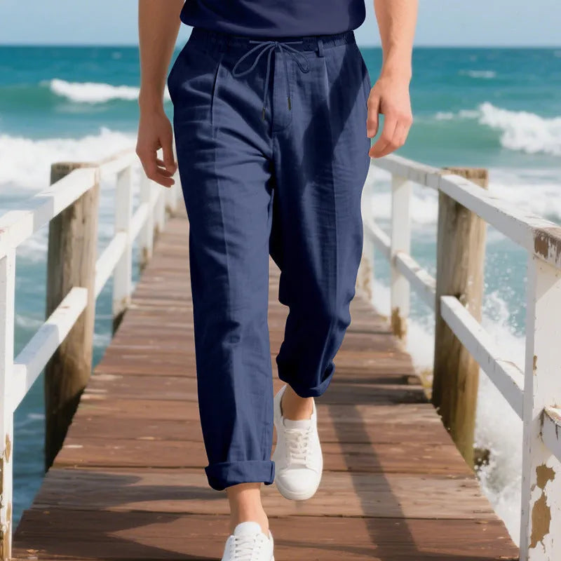 Men's straight-leg linen casual trousers in light khaki colour with a drawstring waist.