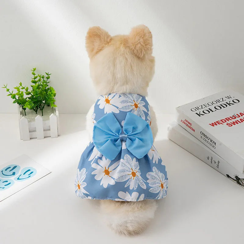 Ultra-thin light orange polyester pet dress for dogs or cats with a floral butterfly knot and bow.