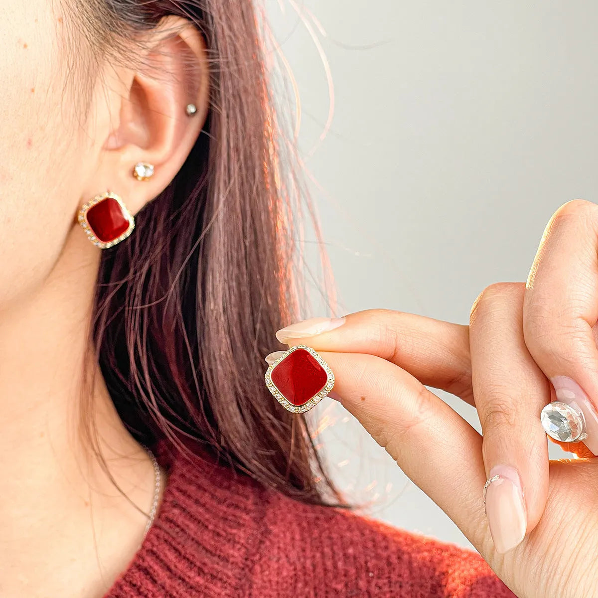 Red square alloy earrings with geometric inlaid design and sweet-cool hybrid style