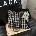 Horizontal square woolen shoulder bag with internal mobile phone and file compartments in black colour